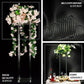 Clear acrylic wedding centerpiece vase with square mirror base, floral arrangement.