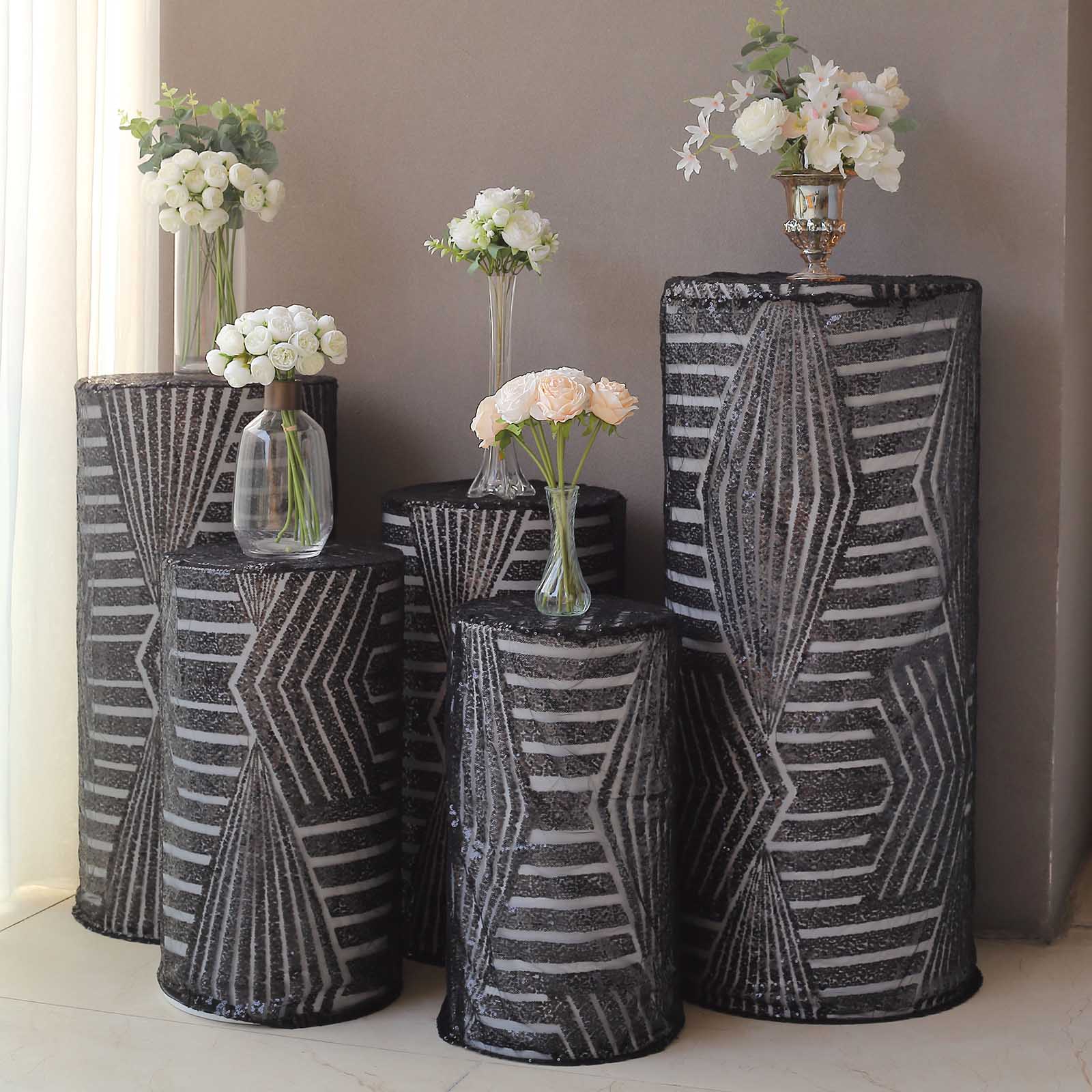 Black sequin mesh pedestal stand covers with geometric pattern embroidery.
