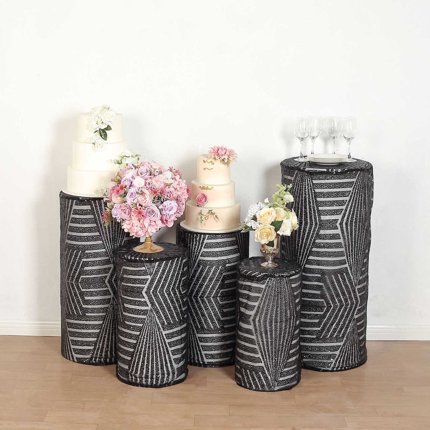 Black sequin mesh pedestal stand covers with geometric pattern embroidery.