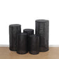 Black sequin mesh cylinder pedestal stand covers with geometric pattern embroidery.