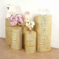 Gold sequin pedestal stand covers with geometric pattern embroidery.