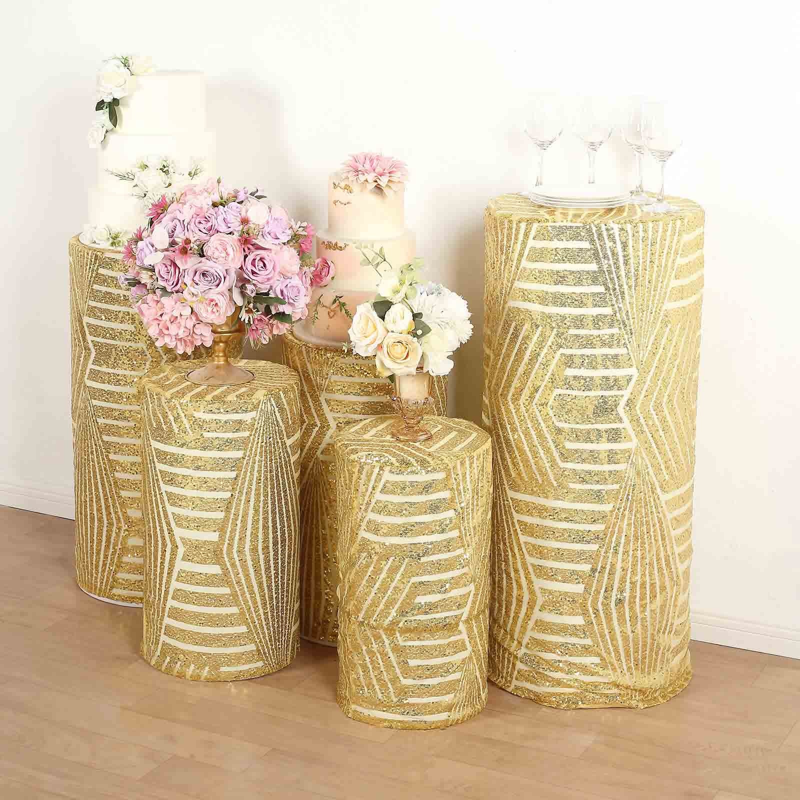 Gold sequin pedestal stand covers with geometric pattern embroidery.