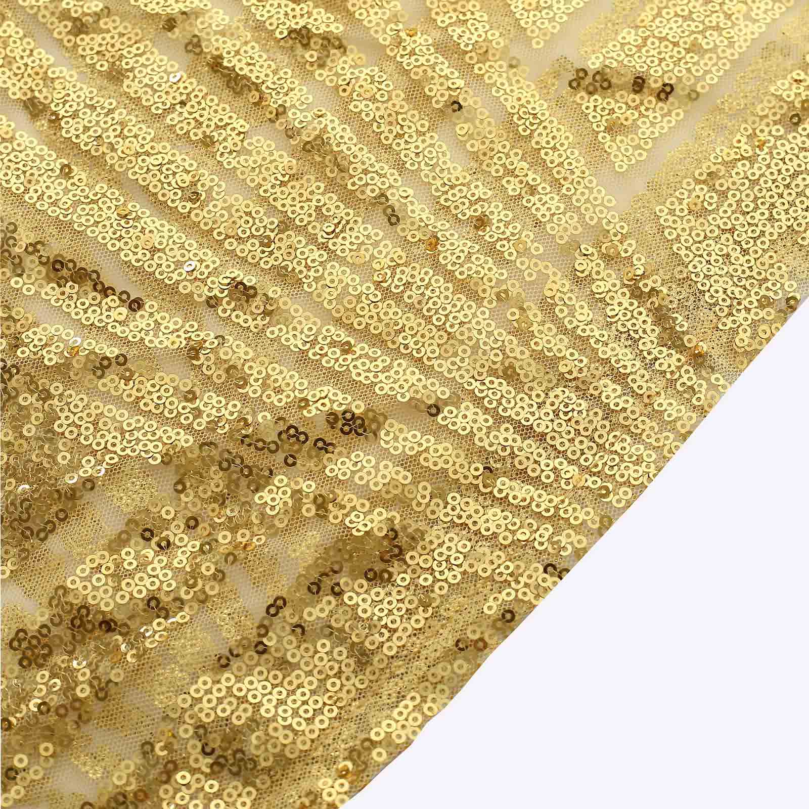 Gold sequin mesh pedestal stand covers with geometric pattern embroidery.