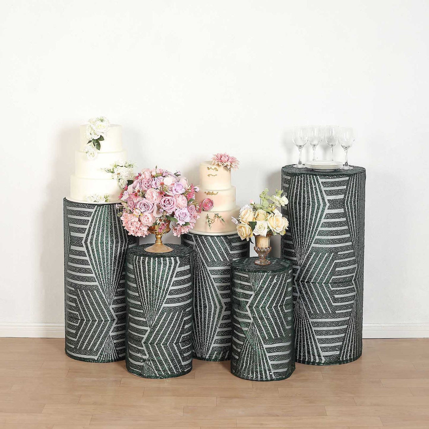 Emerald green sequin mesh pedestal stand covers with geometric pattern.