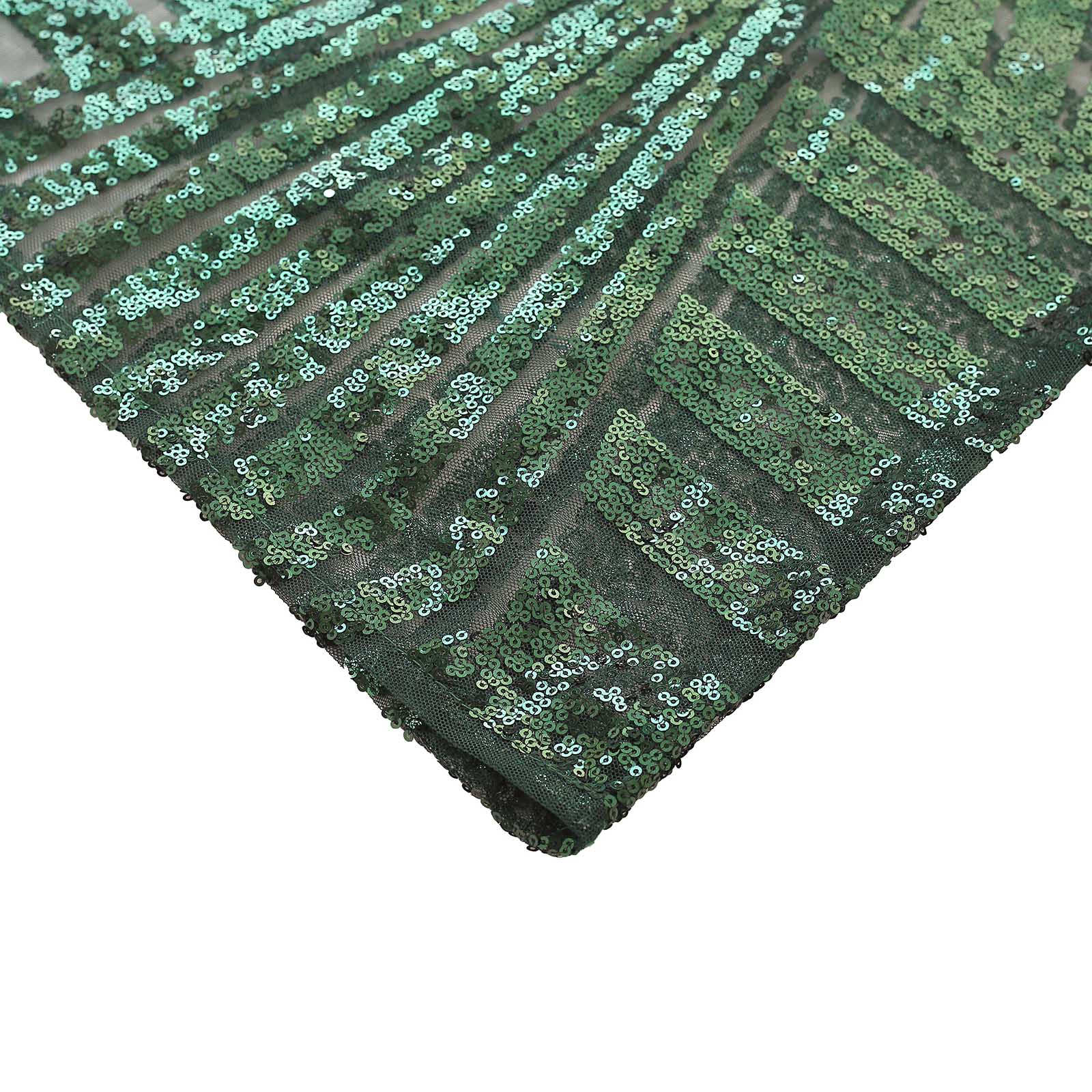 Emerald green sequin mesh cylinder pedestal stand cover with geometric pattern.