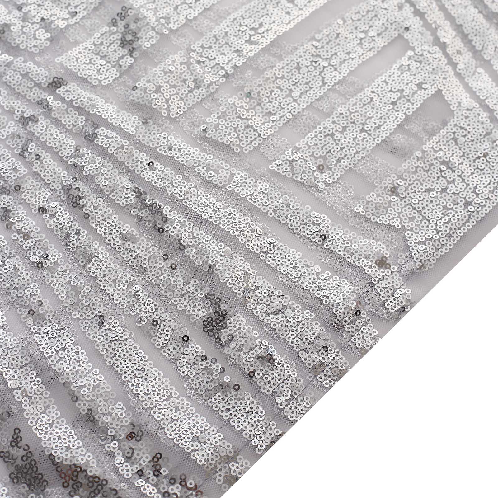 Silver sequin mesh pedestal stand covers with geometric pattern.