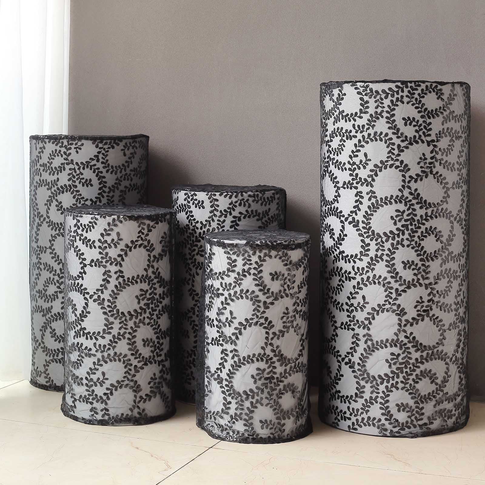 Black sequin mesh pedestal stand covers with leaf vine embroidery.