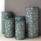 Emerald green sequin mesh pedestal stand covers with leaf vine embroidery.