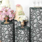 Emerald green sequin mesh pedestal stand covers with leaf vine embroidery.