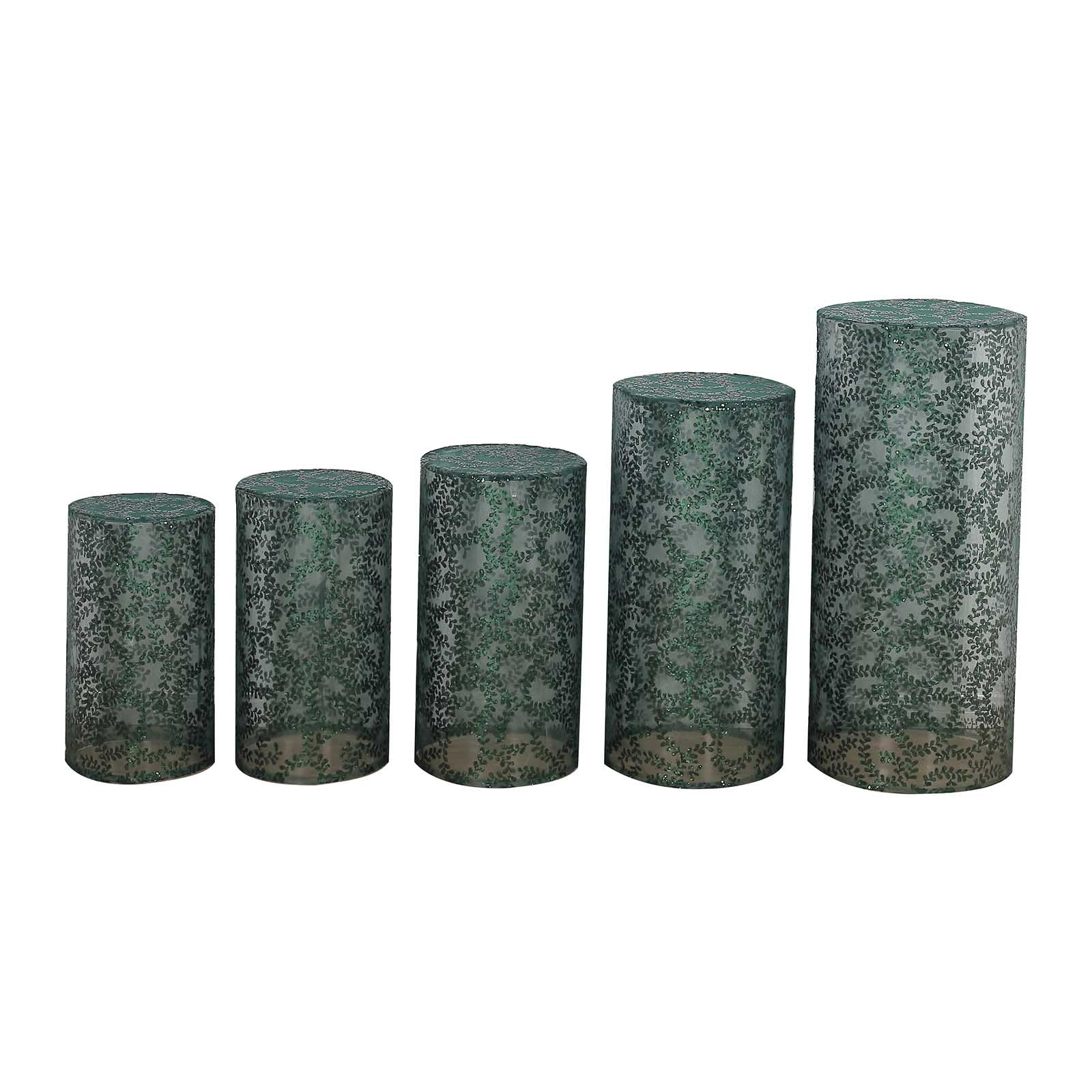 Emerald green sequin mesh cylinder pedestal stand covers with leaf embroidery.
