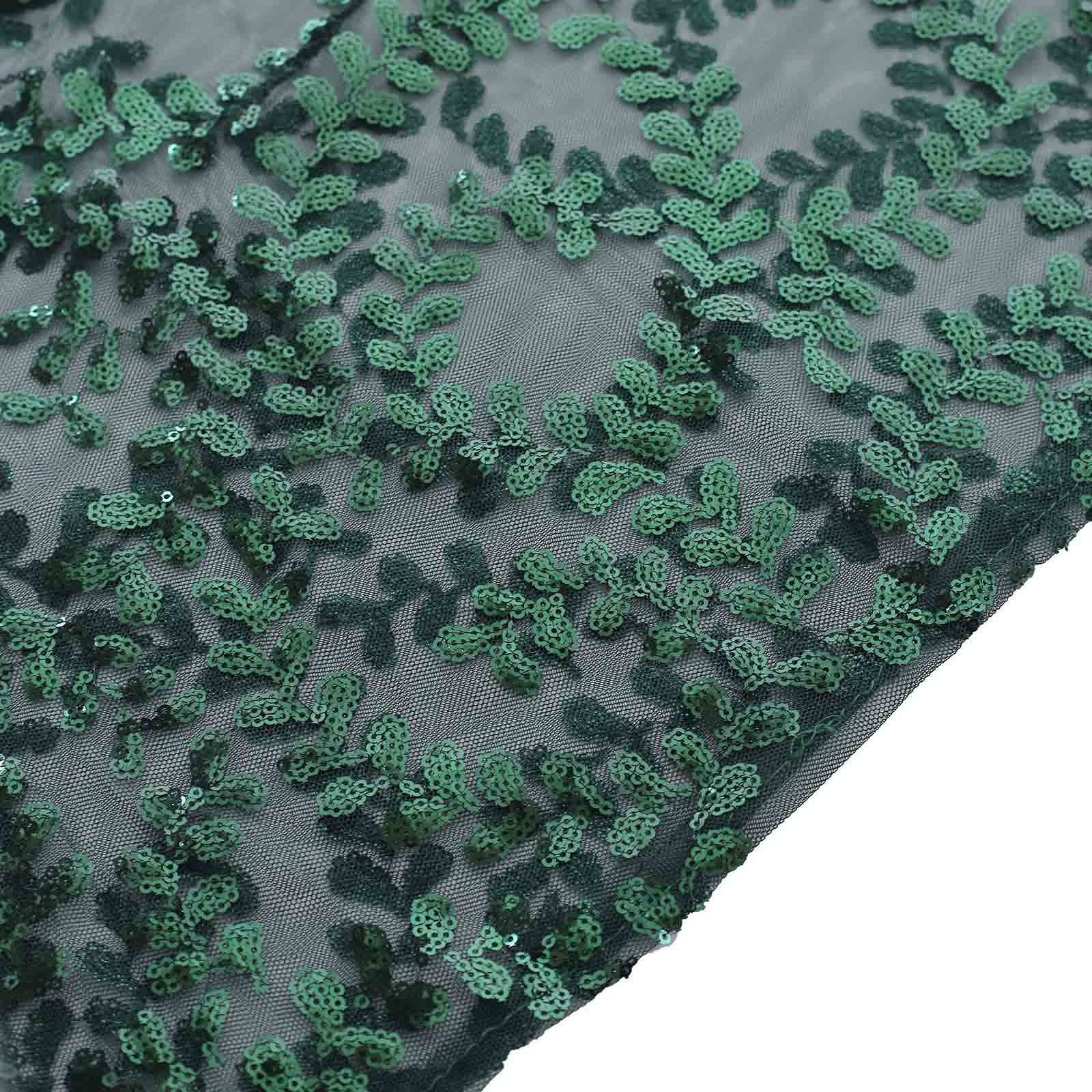 Emerald green sequin mesh pedestal stand cover with leaf vine embroidery.