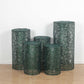 Emerald green sequin mesh pedestal stand covers with leaf vine embroidery.