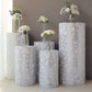 Silver sequin mesh pedestal stand covers with leaf vine embroidery.