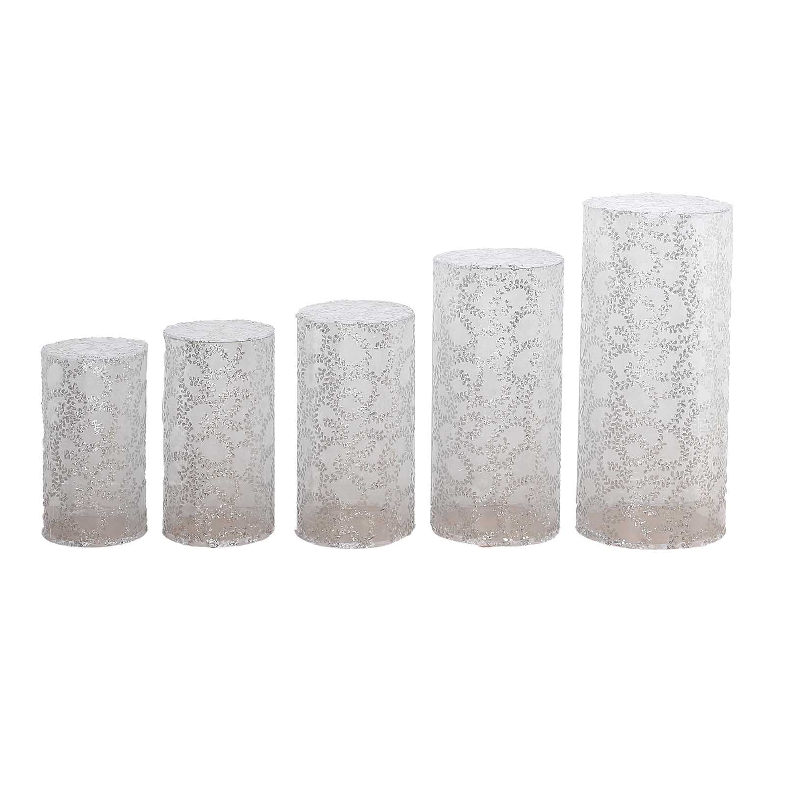 Set of 5 silver sequin mesh cylinder pedestal stand covers with leaf vine embroidery.