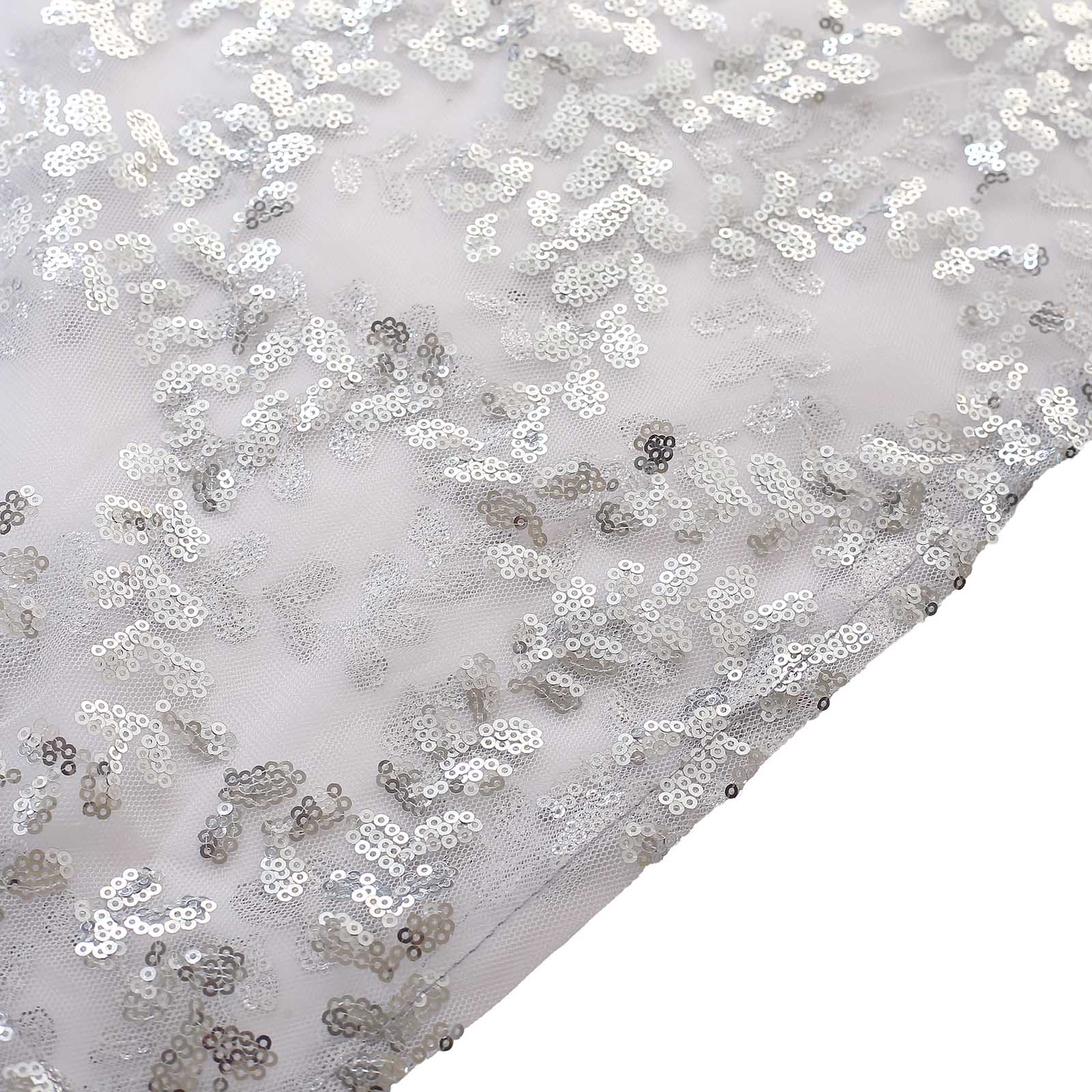 Silver sequin mesh pedestal stand covers with leaf vine embroidery.