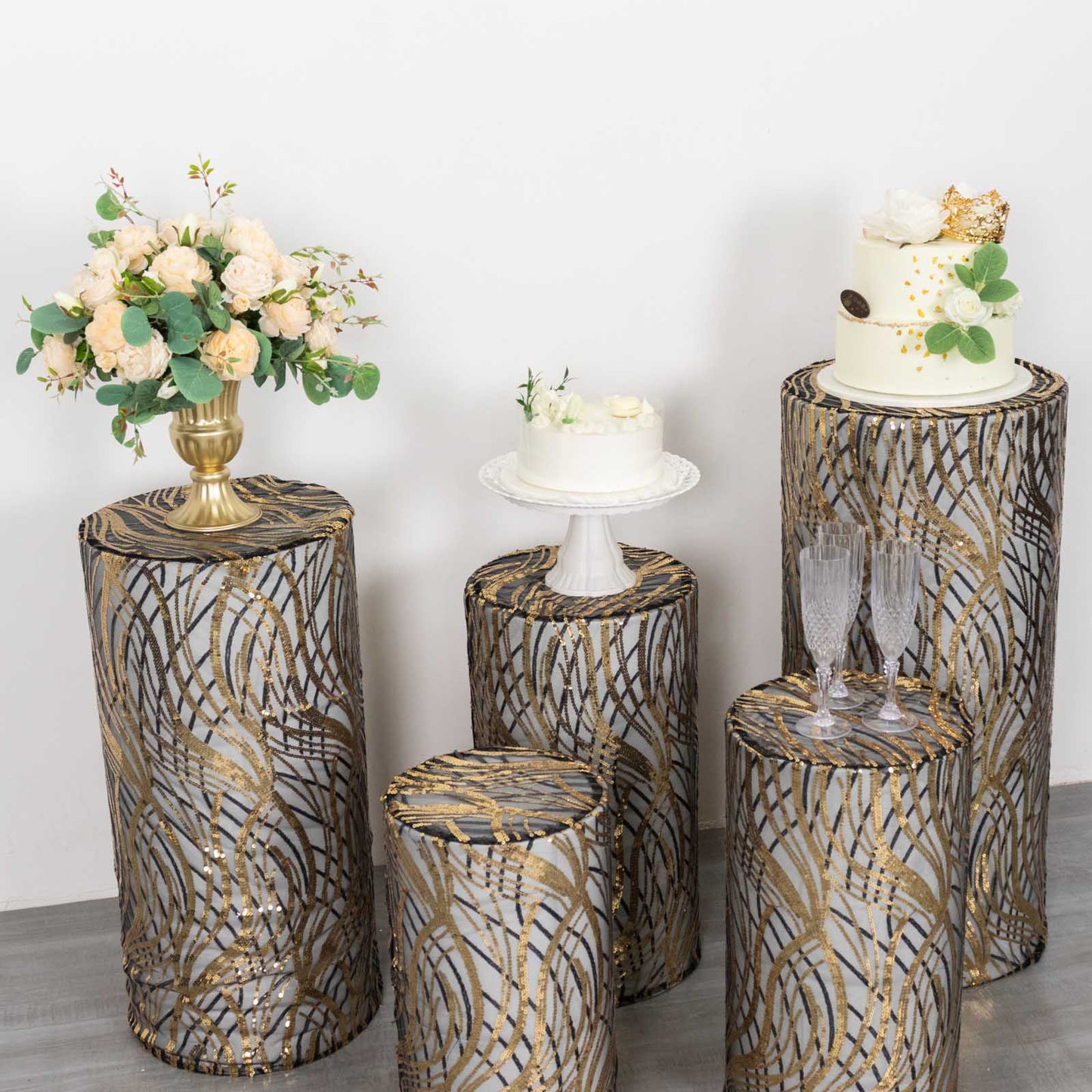 Set of 5 black wave mesh pedestal stand covers with embroidered sequins.
