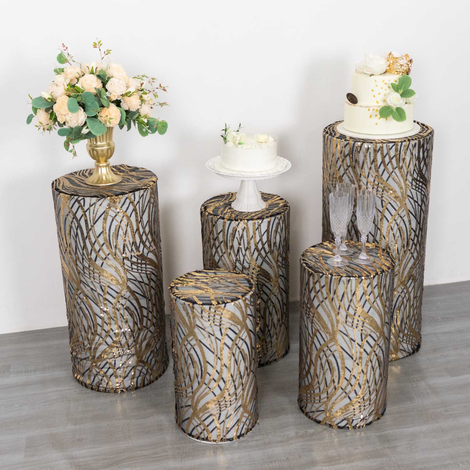 Set of 5 black wave mesh pedestal stand covers with sequins.