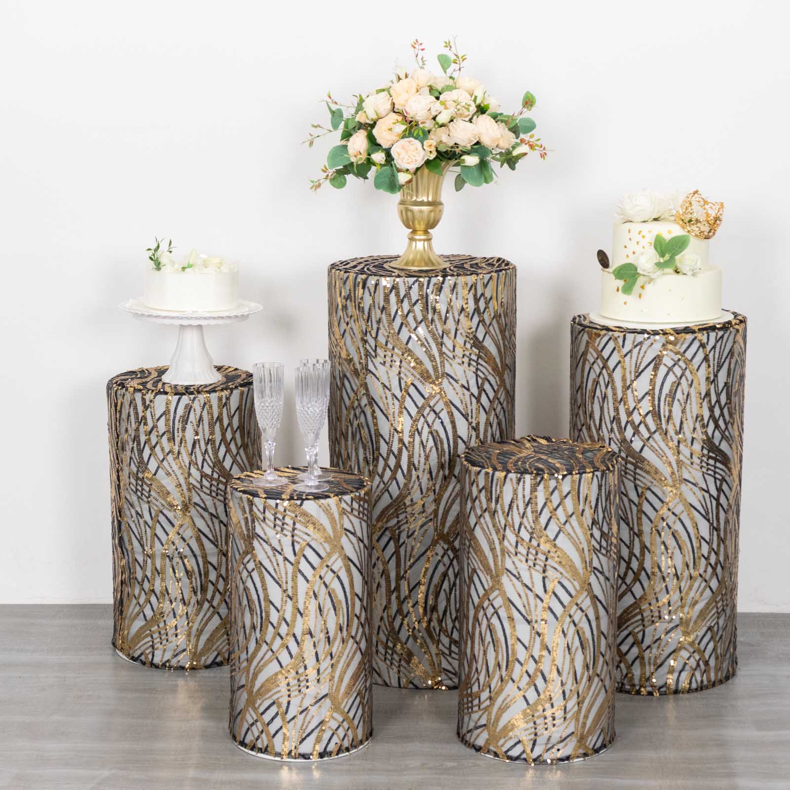 Set of 5 black wave mesh pedestal stand covers with sequins.