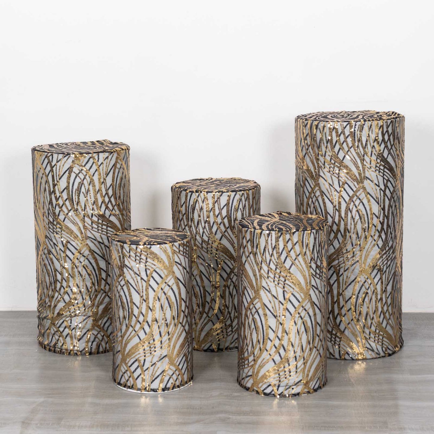 Set of 5 black wave mesh pedestal stand covers with embroidered sequins.