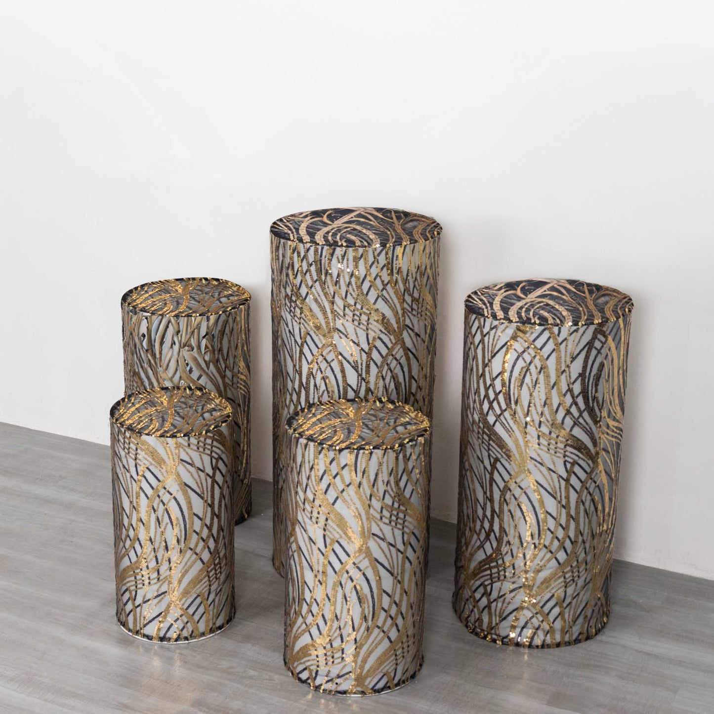 Set of 5 black wave mesh pedestal stand covers with embroidered sequins.
