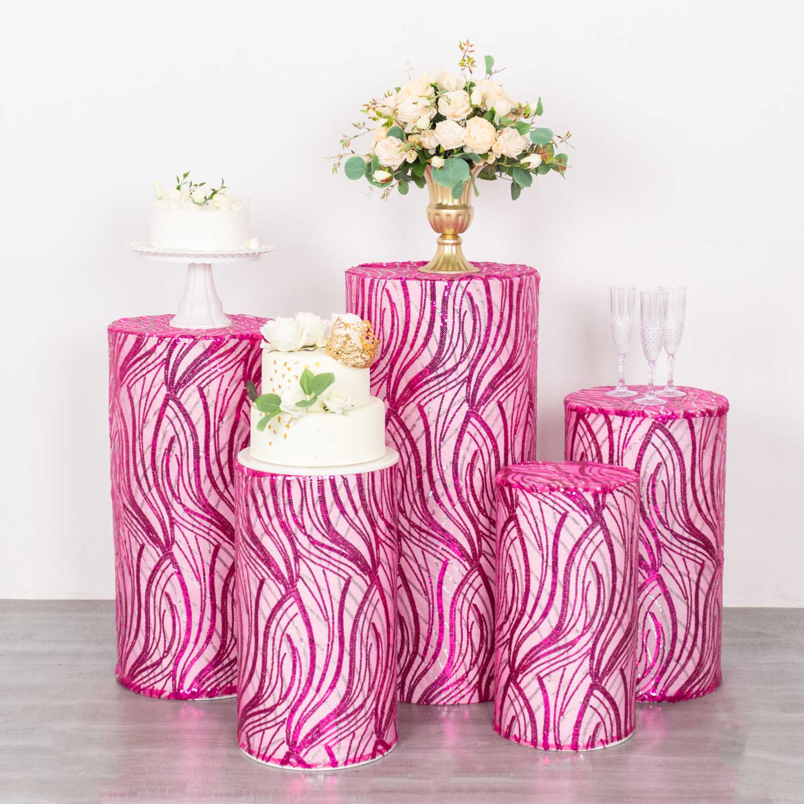Fuchsia wave mesh cylinder pedestal stand covers with embroidered sequins.