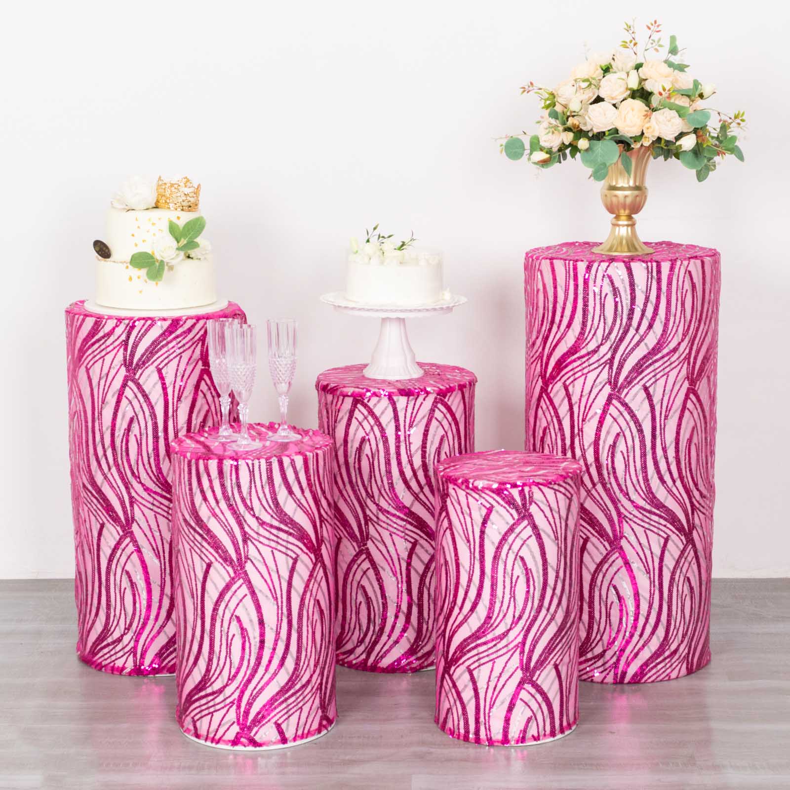 Fuchsia wave mesh pedestal stand covers with embroidered sequins.