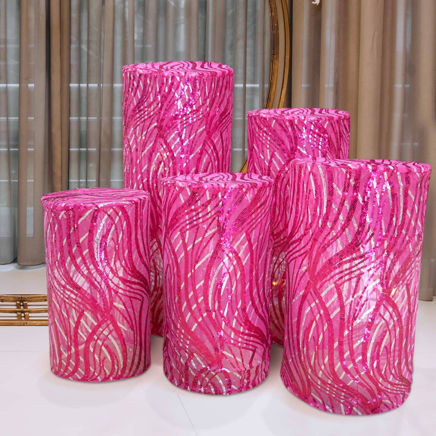 Fuchsia wave mesh cylinder pedestal stand covers with embroidered sequins.