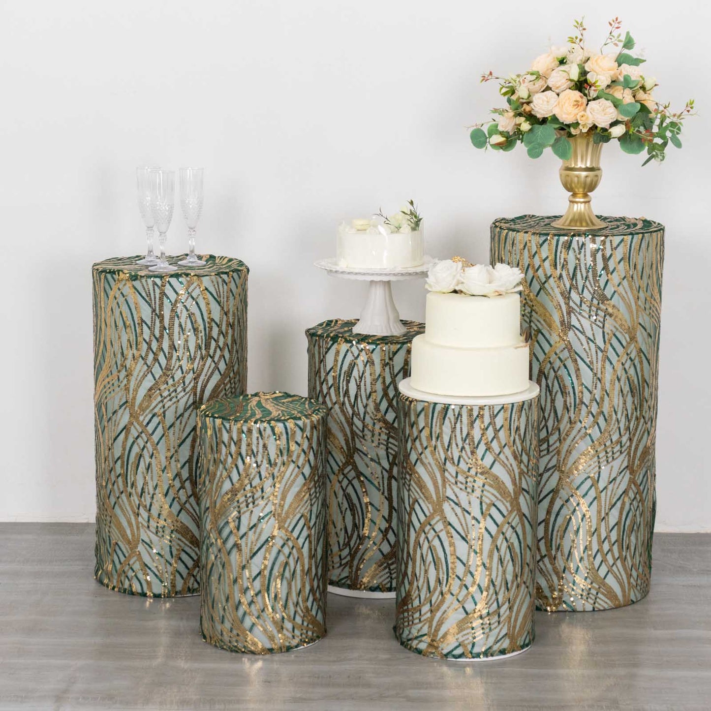 Hunter green wave mesh pedestal stand covers with embroidered sequins.
