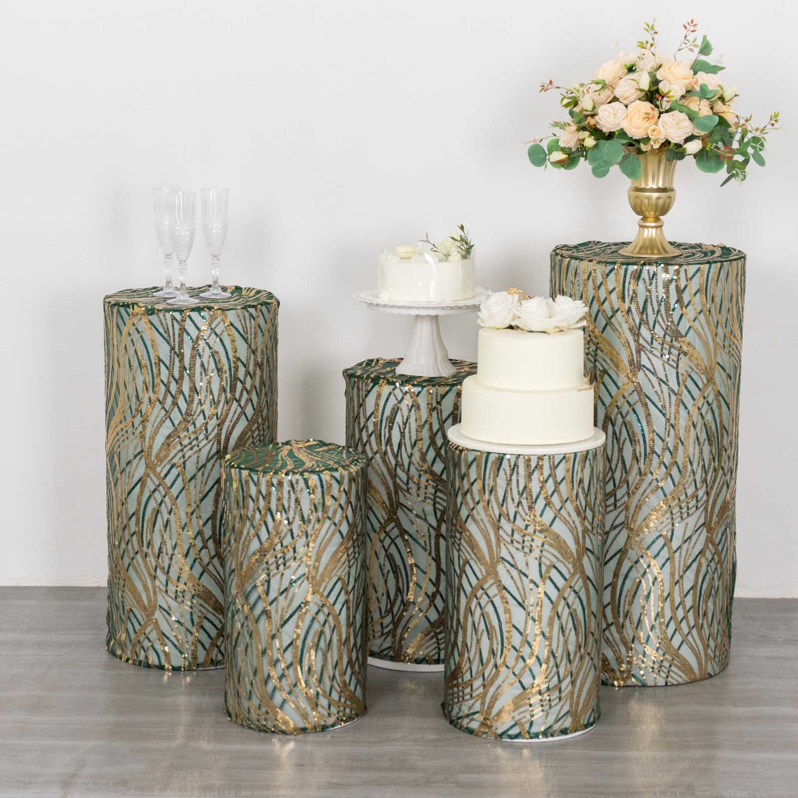 Hunter green wave mesh pedestal stand covers with embroidered sequins.