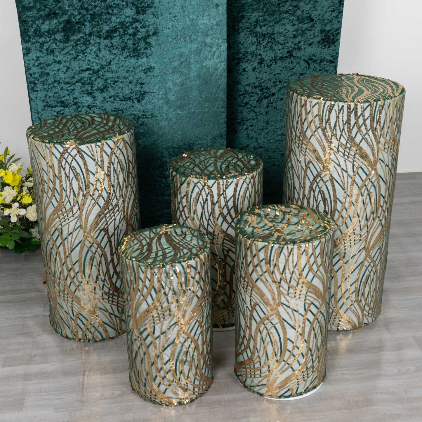 Hunter green wave mesh pedestal stand covers with embroidered sequins.