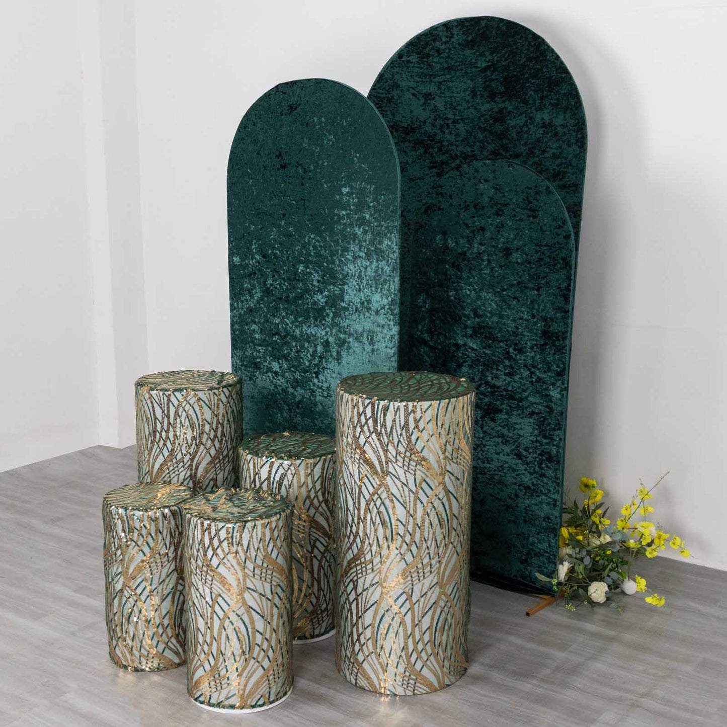 Hunter green wave mesh pedestal stand covers with embroidered sequins.