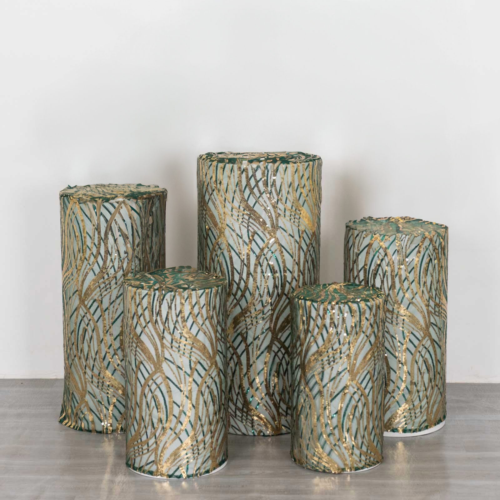Set of 5 hunter green wave mesh pedestal stand covers with sequins.