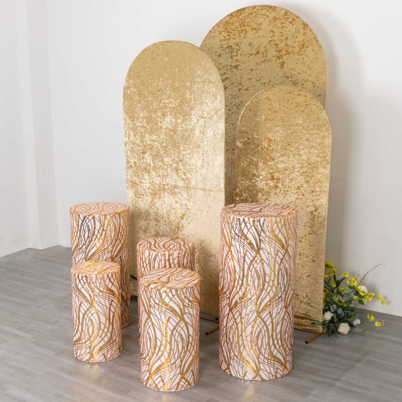 Gold wave mesh cylinder pedestal stand covers with embroidered sequins.