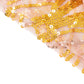 Gold wave mesh pedestal stand cover with embroidered sequins.