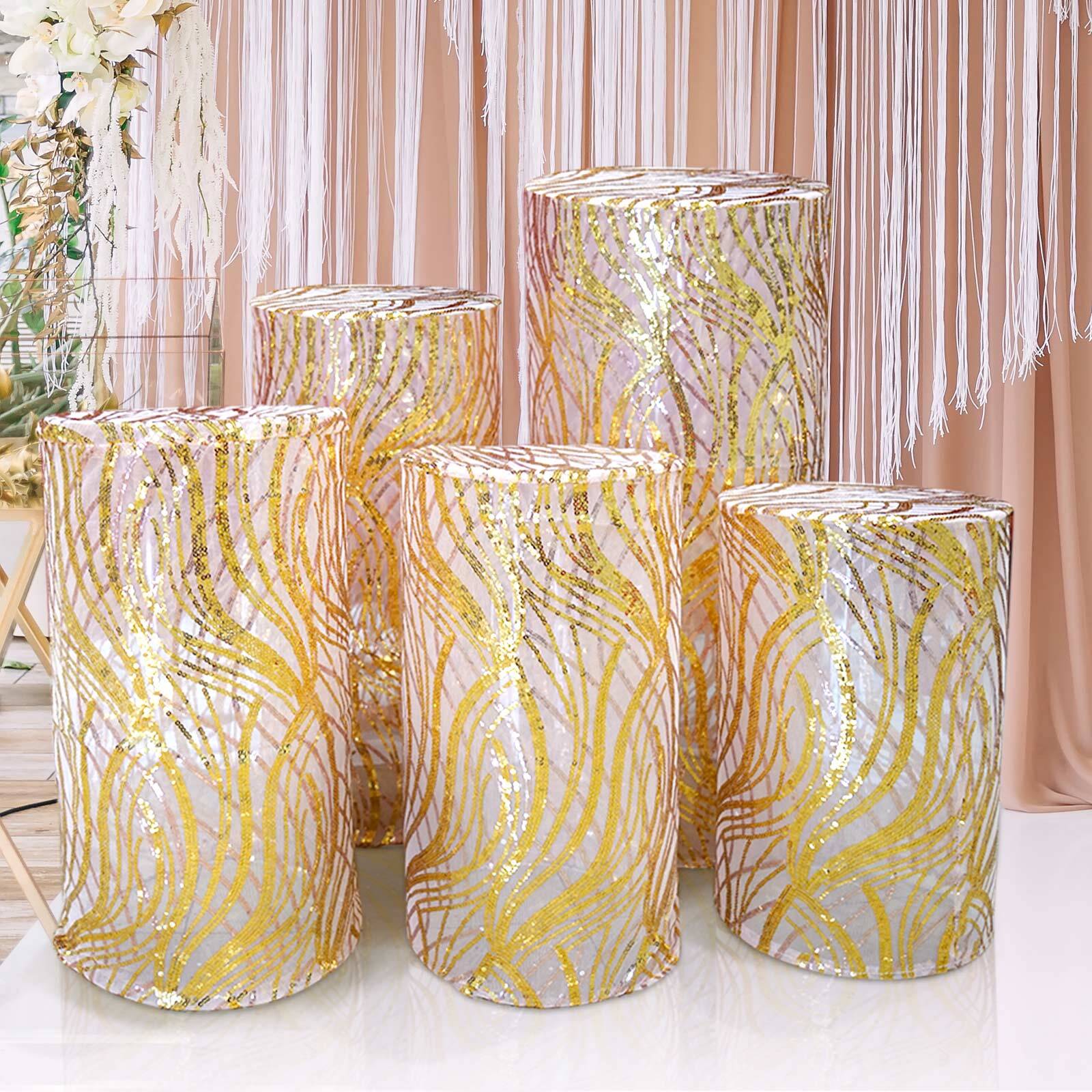 Set of 5 rose gold wave mesh cylinder pedestal stand covers with sequins.