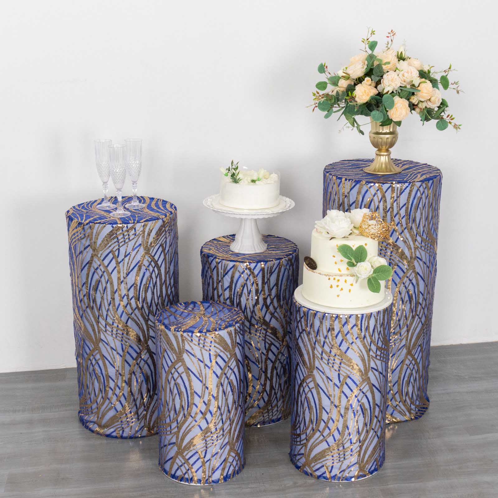 Royal blue wave mesh pedestal stand covers with embroidered sequins.