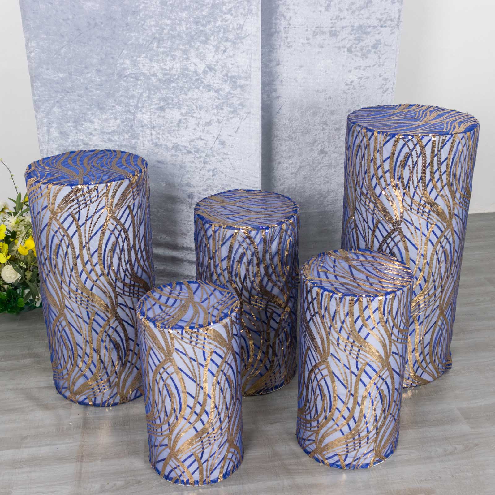 Royal blue wave mesh pedestal stand covers with embroidered sequins.