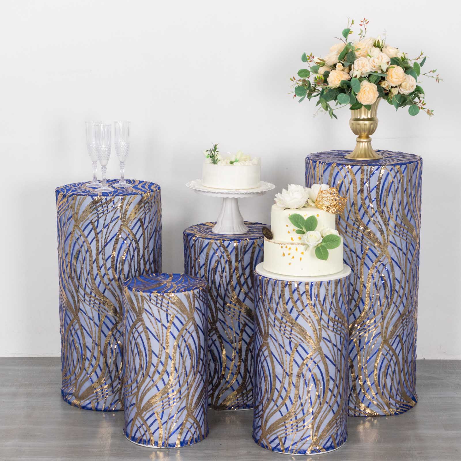 Royal blue wave mesh pedestal stand covers with embroidered sequins.