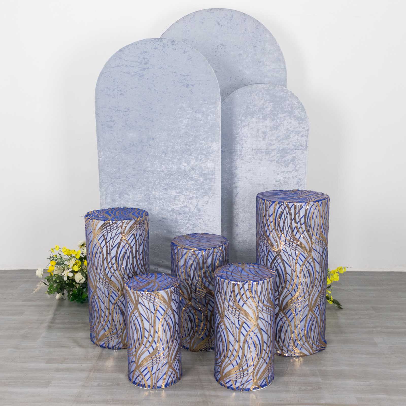 Set of 5 royal blue wave mesh pedestal stand covers with sequins.