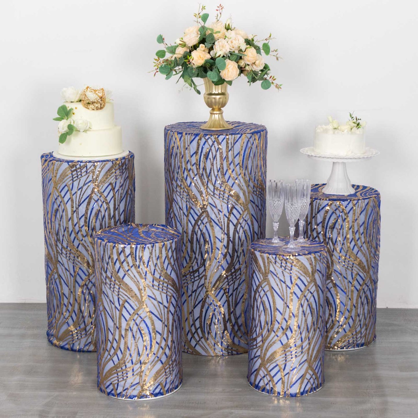 Royal blue wave mesh pedestal stand covers with embroidered sequins.