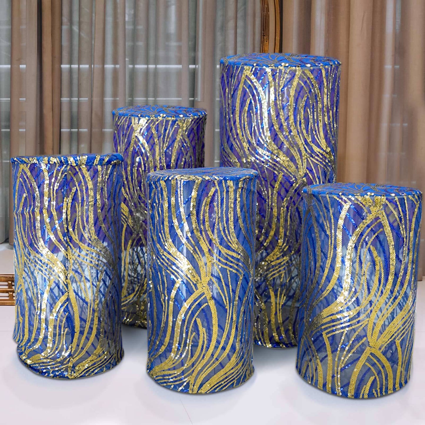 Royal blue wave mesh pedestal stand covers with embroidered sequins.