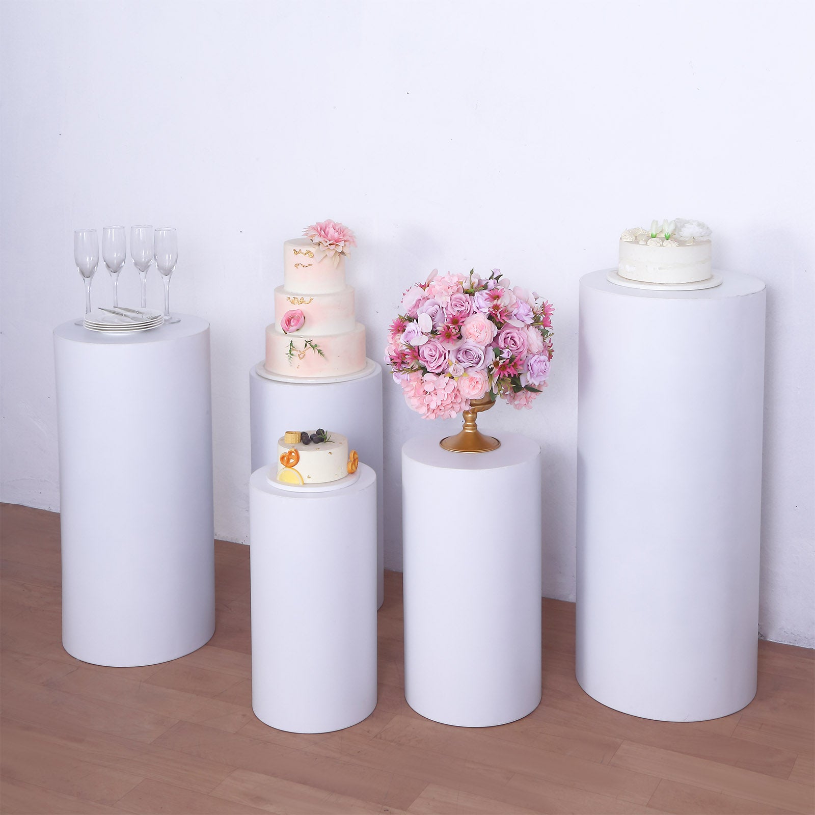 White metal cylinder pillar stands for wedding displays, set of 5.