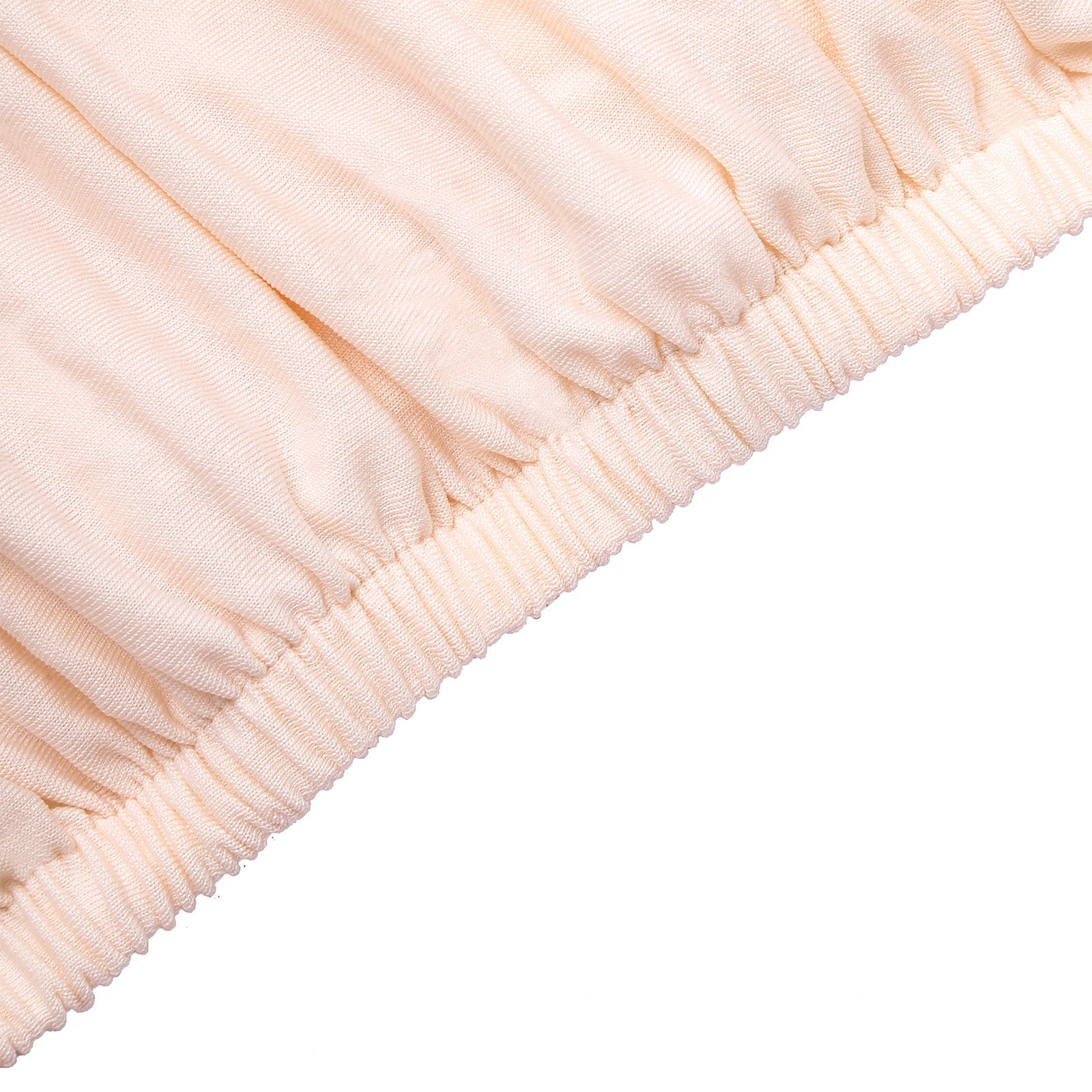 Blush spandex pedestal stand cover with stretchable design.