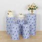 White and blue floral spandex pedestal stand covers set on display.