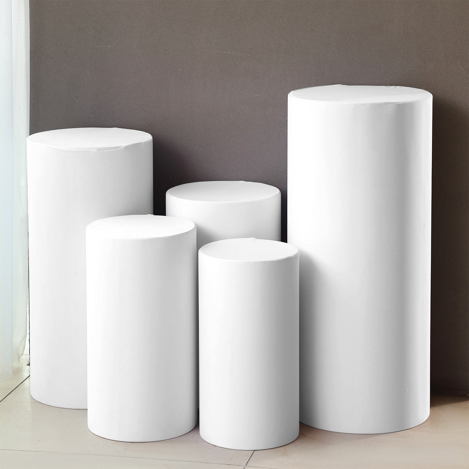 White spandex cylinder pedestal stand covers set of 5, stretchable pillar prop covers.