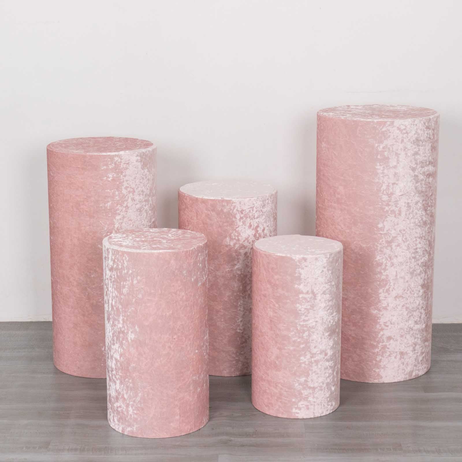 Blush crushed velvet cylinder pedestal stand covers in a set of 5.