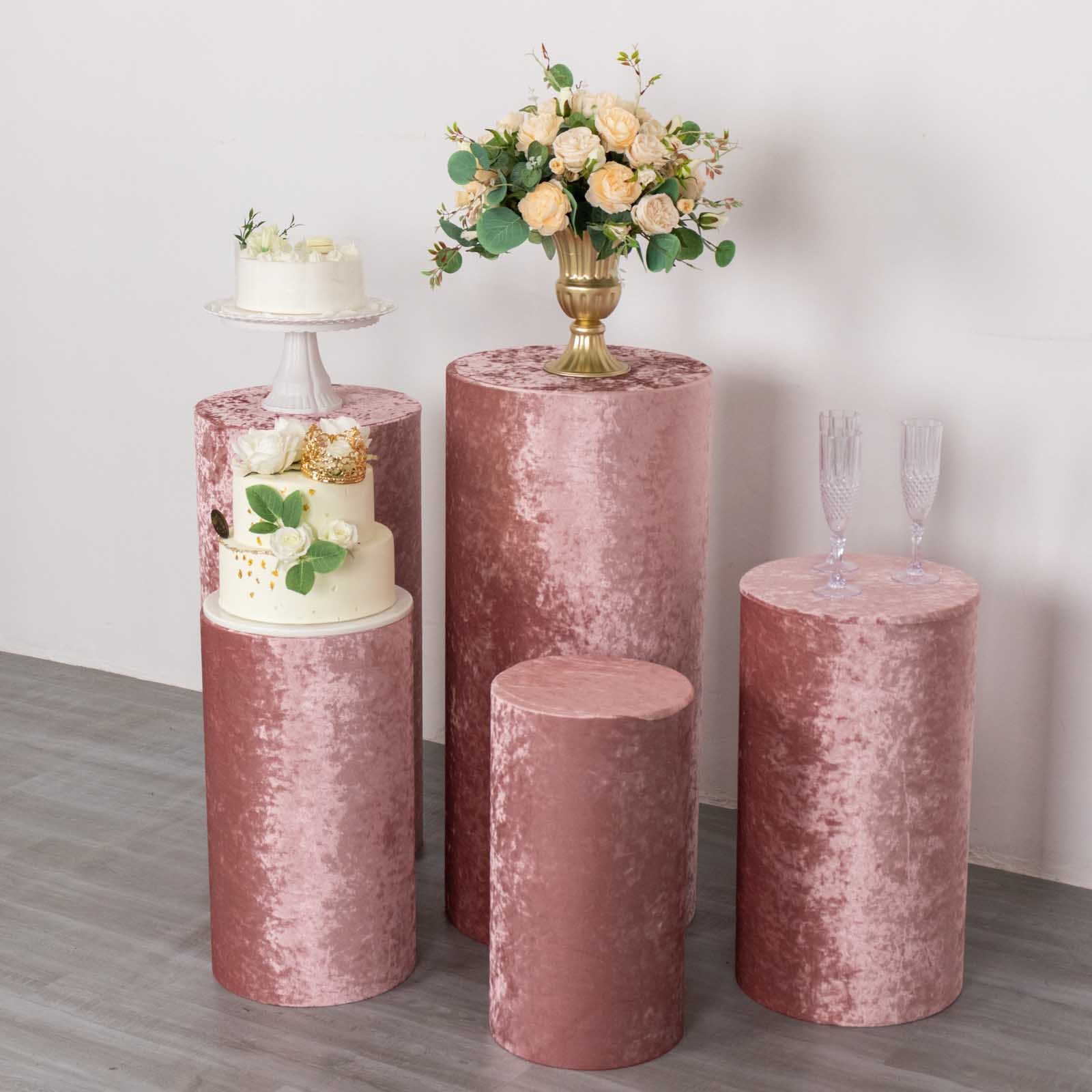 Dusty rose crushed velvet pedestal stand covers for elegant displays.