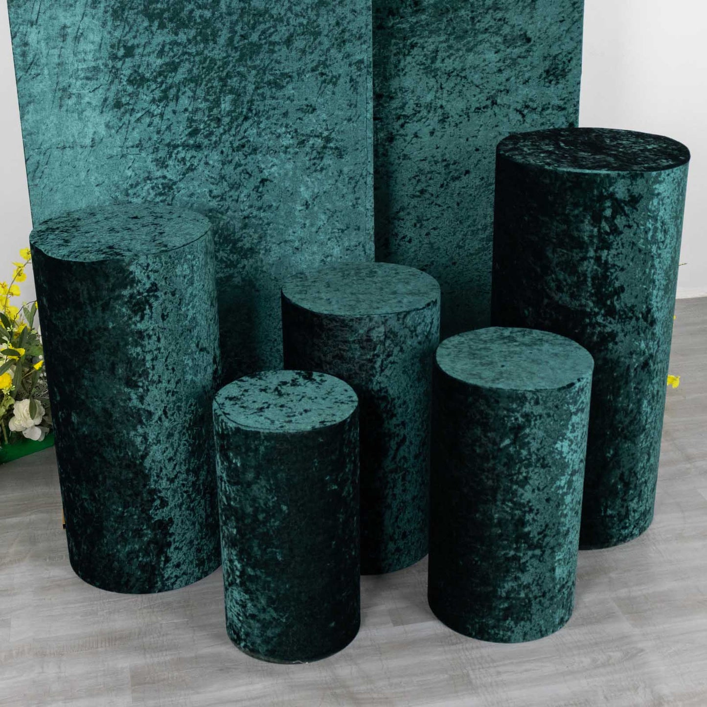 Hunter emerald green crushed velvet pedestal stand covers.