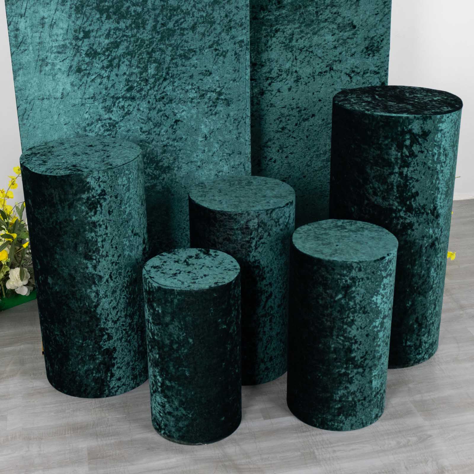 Hunter emerald green crushed velvet pedestal stand covers.