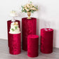Set of 5 red crushed velvet pedestal stand covers for elegant decor.